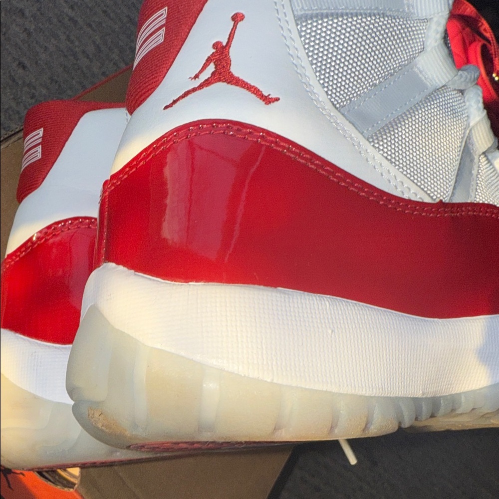 Jordan Cherry Red 11s High-Top Red and White Sneakers - Picture 8 of 9